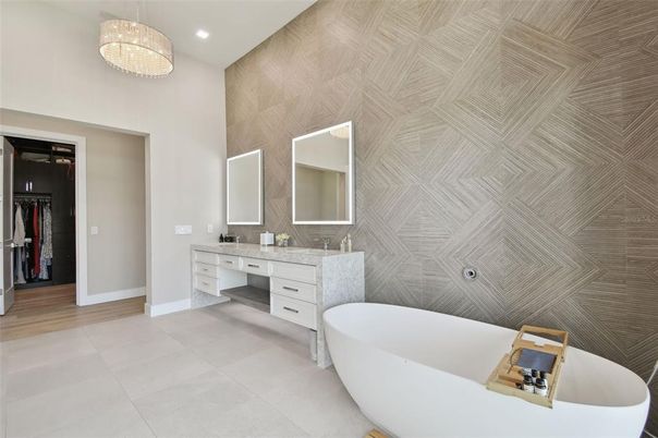 Bathroom, Chandelier, Dual Sink Vanities, Free Standing Baths, Interior, Recessed Lighting