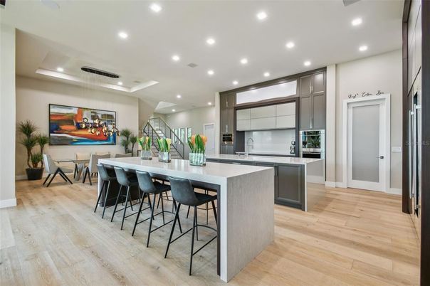 Dining room, Interior, Kitchen, Recessed Lighting, Stainless Steel Appliances, Wood Texture Flooring