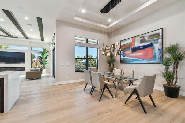 Dining room, Fireplace, Interior, Pendant Lights, Recessed Lighting, Wood Texture Flooring