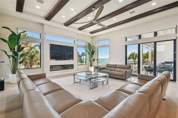 Fireplace, Interior, Living room, Recessed Lighting, Water, Wooden Beams, Wood Texture Flooring
