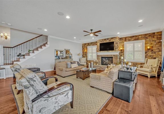 Fireplace, Interior, Living room, Recessed Lighting, Stone Walls, Wood Texture Flooring