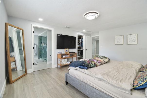Bathroom, Bedroom, Glass Shower, Interior, Recessed Lighting, Wood Texture Flooring