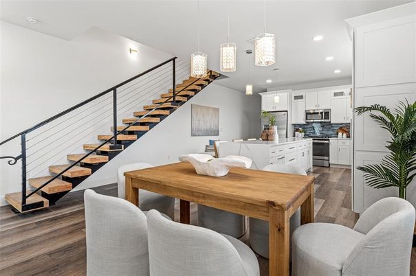 Dining room, Interior, Kitchen, Pendant Lights, Recessed Lighting, Stainless Steel Appliances, Wood Texture Flooring