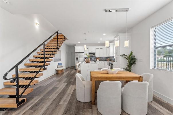 Dining room, Interior, Kitchen, Pendant Lights, Recessed Lighting, Stainless Steel Appliances, Wood Texture Flooring
