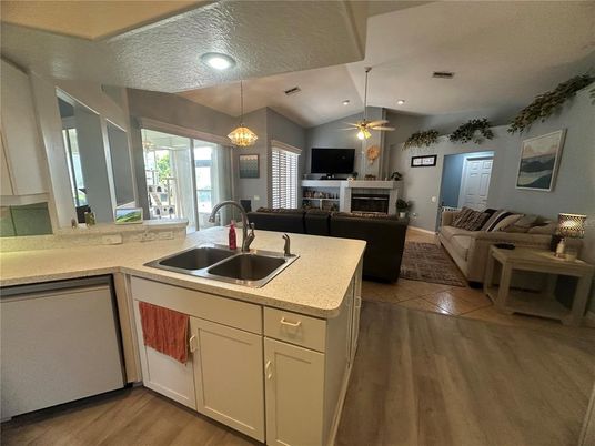 Fireplace, Interior, Kitchen, Living room, Pendant Lights, Recessed Lighting, Wood Texture Flooring