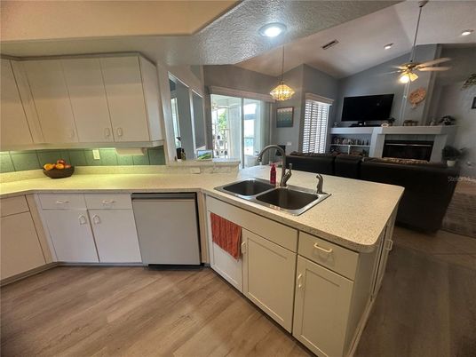 Fireplace, Interior, Kitchen, Pendant Lights, Recessed Lighting, Wood Texture Flooring