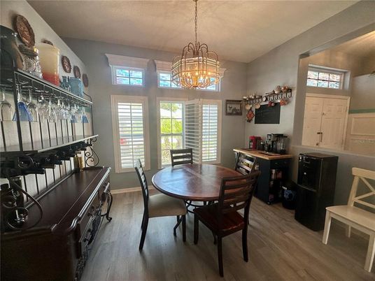 Chandelier, Dining room, Interior, Pendant Lights, Wood Texture Flooring