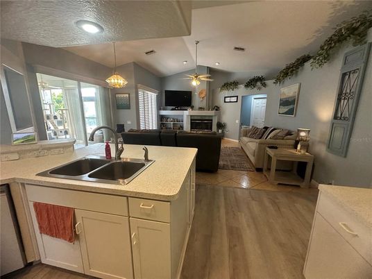 Fireplace, Interior, Kitchen, Living room, Pendant Lights, Recessed Lighting, Wood Texture Flooring