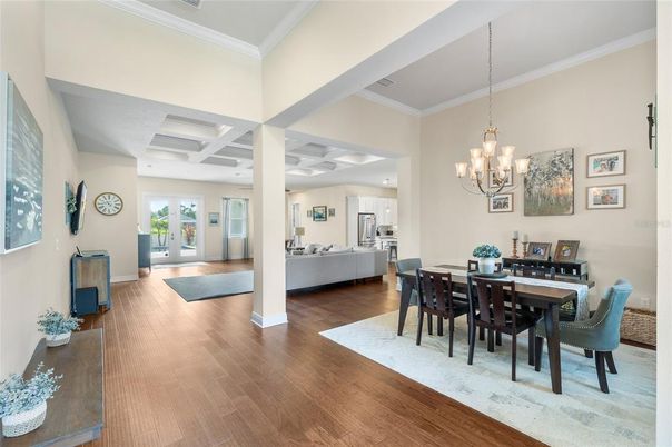 Chandelier, Dining room, Interior, Kitchen, Stainless Steel Appliances, Wood Texture Flooring