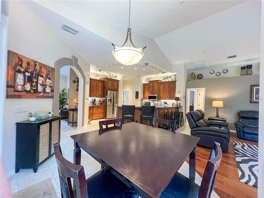 Dining room, Interior, Kitchen, Living room, Pendant Lights, Recessed Lighting, Stainless Steel Appliances, Wood Texture Flooring