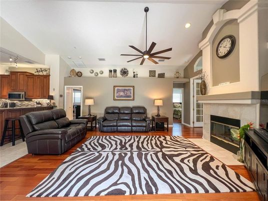 Fireplace, Interior, Kitchen, Living room, Recessed Lighting, Wood Texture Flooring