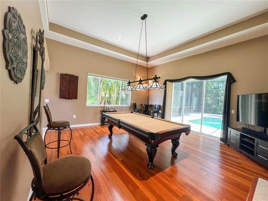 Billiard Table, Chandelier, Game Room, Interior, Pendant Lights, Recessed Lighting, Wood Texture Flooring