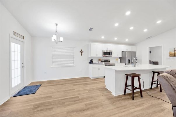 Interior, Kitchen, Pendant Lights, Recessed Lighting, Stainless Steel Appliances, Wood Texture Flooring