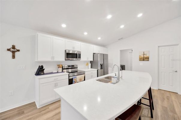 Interior, Kitchen, Recessed Lighting, Stainless Steel Appliances, Wood Texture Flooring