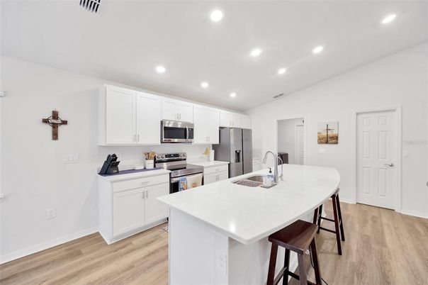 Interior, Kitchen, Recessed Lighting, Stainless Steel Appliances, Wood Texture Flooring