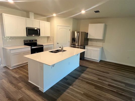 Interior, Kitchen, Recessed Lighting, Stainless Steel Appliances, Wood Texture Flooring