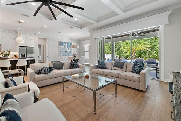 Dining room, Interior, Kitchen, Living room, Pendant Lights, Recessed Lighting, Stainless Steel Appliances, Wood Texture Flooring