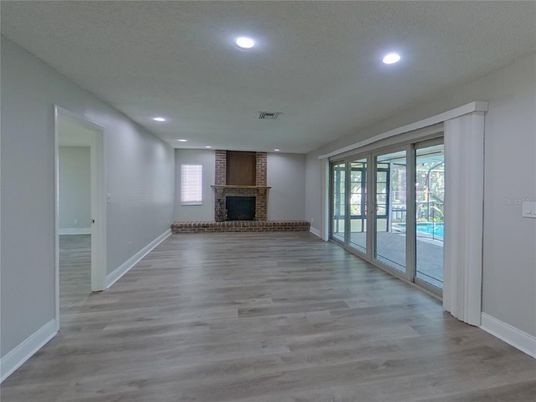 Empty room, Fireplace, Interior, Recessed Lighting, Wood Texture Flooring