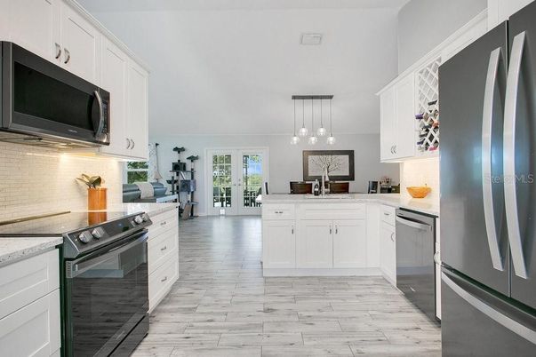 Interior, Kitchen, Pendant Lights, Stainless Steel Appliances, Wood Texture Flooring