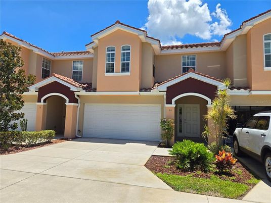 Attached, Exterior, Facade, Mediterranean