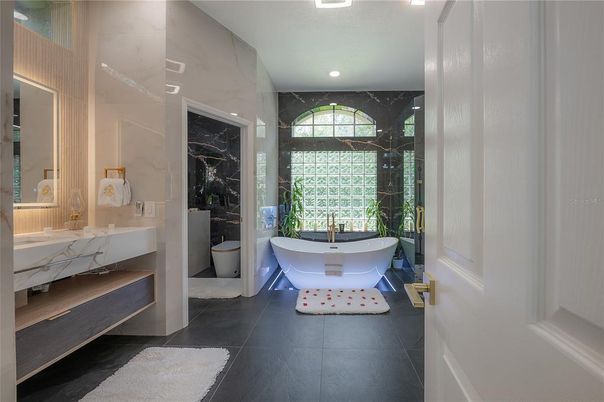 Bathroom, Free Standing Baths, Interior, Marble Walls, Recessed Lighting