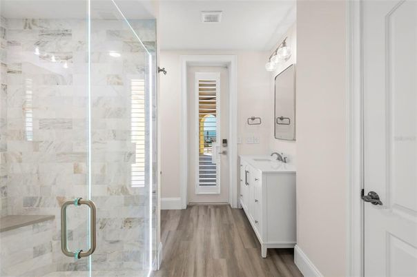 Bathroom, Glass Shower, Interior, Marble Walls, Wood Texture Flooring