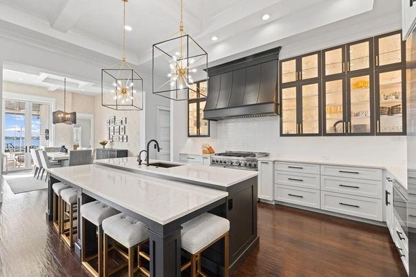 Dining room, Interior, Kitchen, Pendant Lights, Recessed Lighting, Stainless Steel Appliances, Water, Wood Texture Flooring