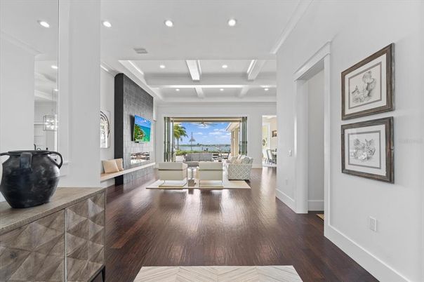 Fireplace, Interior, Living room, Recessed Lighting, Water, Wood Texture Flooring
