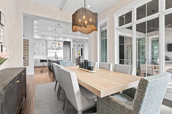 Chandelier, Dining room, Interior, Kitchen, Pendant Lights, Recessed Lighting, Stainless Steel Appliances, Wood Texture Flooring