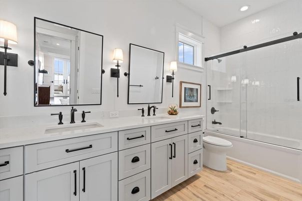 Bathroom, Dual Sink Vanities, Glass Shower, Interior, Recessed Lighting, Wood Texture Flooring