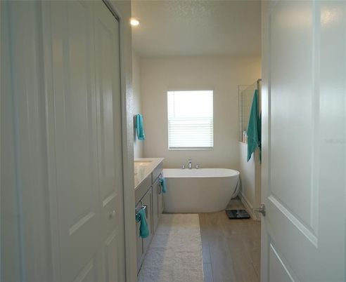 Bathroom, Free Standing Baths, Interior, Recessed Lighting, Wood Texture Flooring