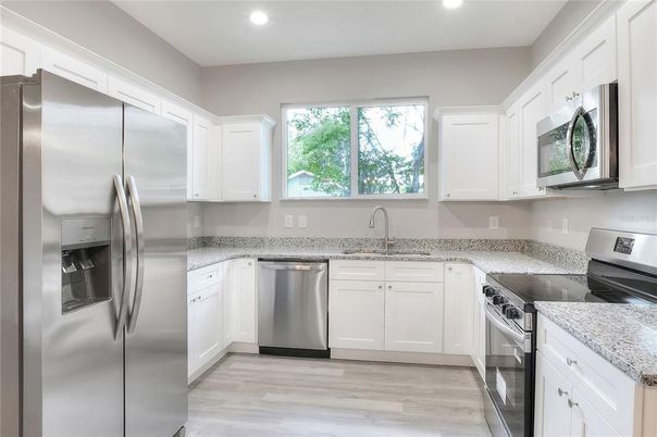 Interior, Kitchen, Recessed Lighting, Stainless Steel Appliances, Wood Texture Flooring