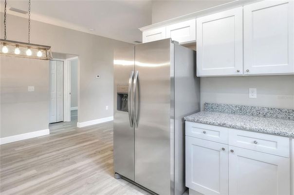 Interior, Kitchen, Pendant Lights, Stainless Steel Appliances, Wood Texture Flooring