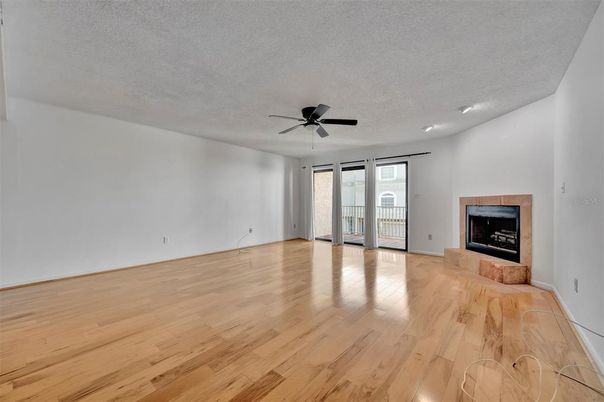 Empty room, Fireplace, Interior, Recessed Lighting, Wood Texture Flooring