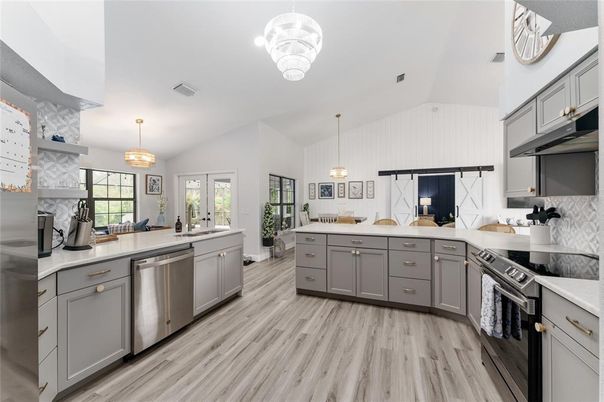 Chandelier, Interior, Kitchen, Pendant Lights, Stainless Steel Appliances, Wood Texture Flooring