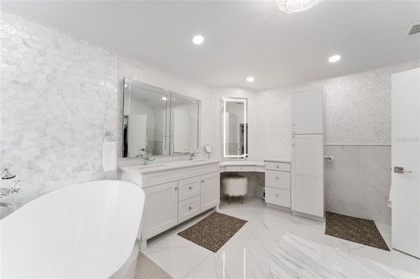 Bathroom, Dual Sink Vanities, Free Standing Baths, Interior, Marble, Marble Walls, Recessed Lighting