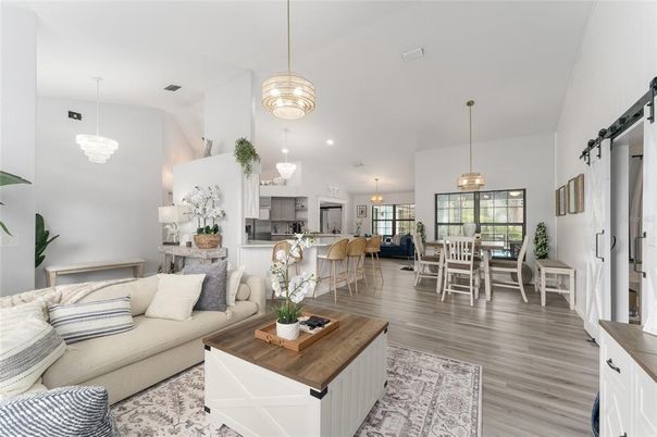 Chandelier, Dining room, Interior, Kitchen, Living room, Pendant Lights, Recessed Lighting, Wood Texture Flooring