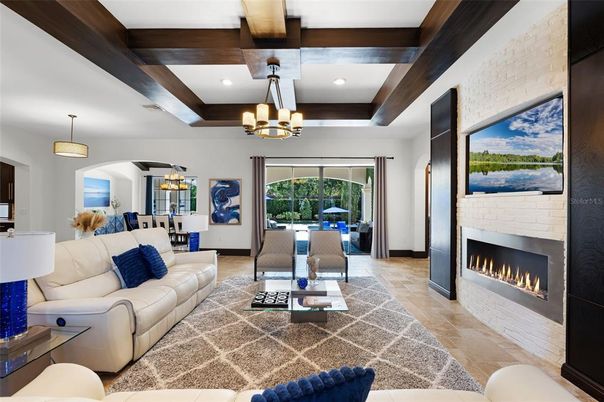 Chandelier, Dining room, Fireplace, Interior, Living room, Pendant Lights, Recessed Lighting, Wooden Beams