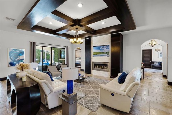 Chandelier, Fireplace, Interior, Living room, Pendant Lights, Recessed Lighting, Wooden Beams