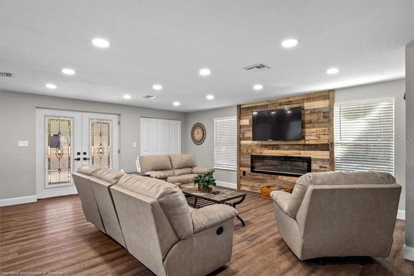 Fireplace, Interior, Living room, Recessed Lighting, Wood Texture Flooring, Wooden Walls