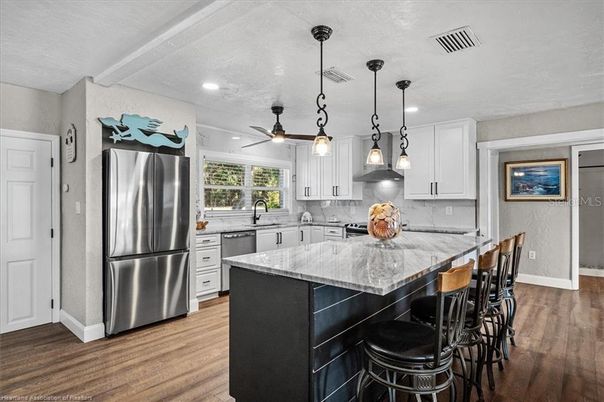 Interior, Kitchen, Pendant Lights, Recessed Lighting, Stainless Steel Appliances, Wood Texture Flooring