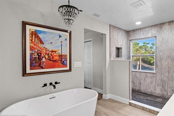 Bathroom, Free Standing Baths, Interior, Pendant Lights, Recessed Lighting, Wood Texture Flooring