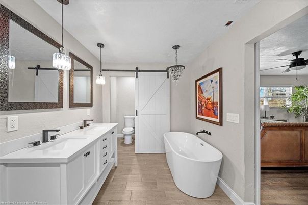 Bathroom, Dual Sink Vanities, Free Standing Baths, Interior, Pendant Lights, Wood Texture Flooring
