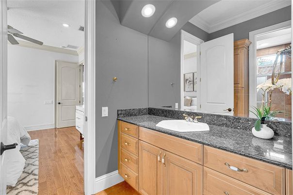Bathroom, Dual Sink Vanities, Interior, Recessed Lighting, Wood Texture Flooring