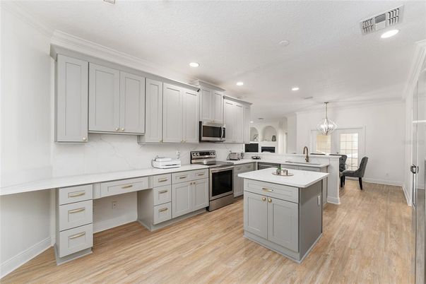 Dining room, Interior, Kitchen, Pendant Lights, Recessed Lighting, Stainless Steel Appliances, Wood Texture Flooring
