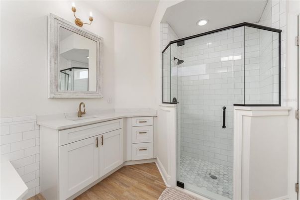 Bathroom, Glass Shower, Interior, Recessed Lighting, Wood Texture Flooring