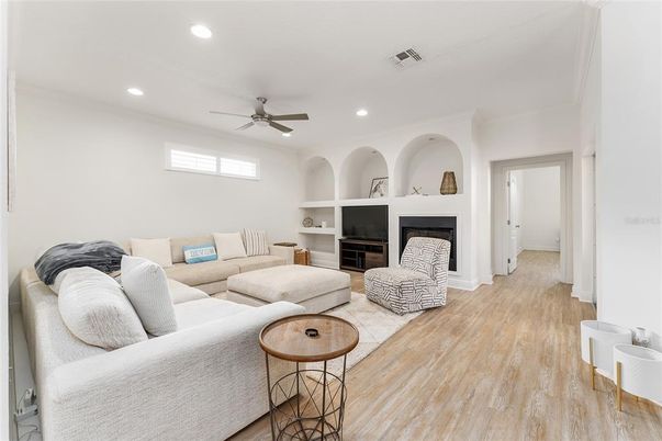 Fireplace, Interior, Living room, Recessed Lighting, Wood Texture Flooring