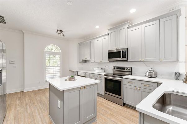 Interior, Kitchen, Recessed Lighting, Stainless Steel Appliances, Wood Texture Flooring