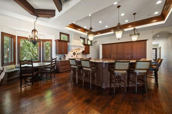 Dining room, Interior, Kitchen, Pendant Lights, Recessed Lighting, Stainless Steel Appliances, Wooden Beams, Wood Texture Flooring