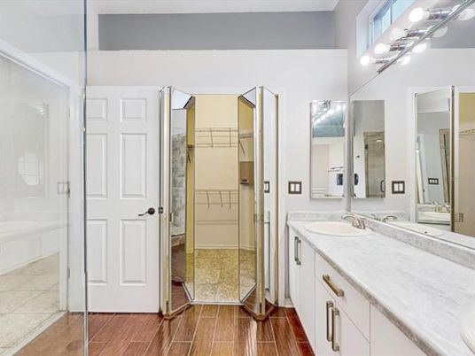 Bathroom, Dual Sink Vanities, Glass Shower, Interior, Wood Texture Flooring